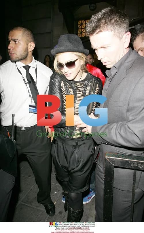 Madonna arriving, leaving Aura Night club