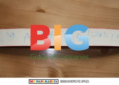 Adam Ant reads book, poses with fan in London