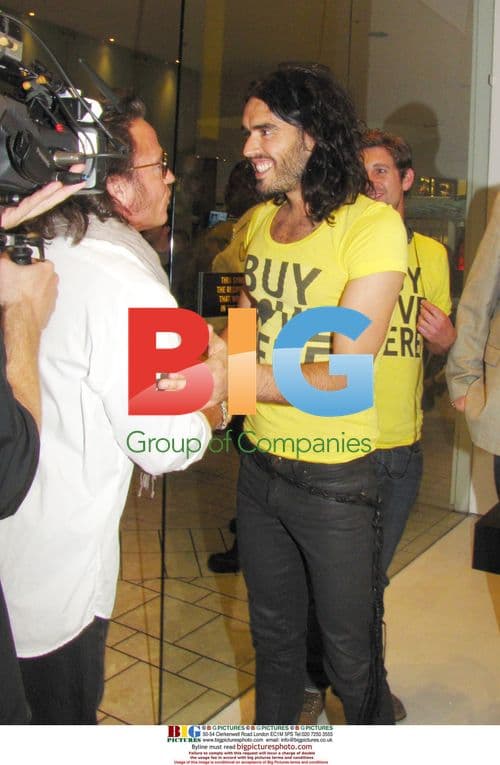 Russell Brand promotes 'BUY LOVE HERE' in West Hollywood