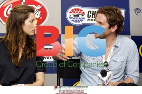 Jennifer Biel and Bradley Cooper at NASCAR event