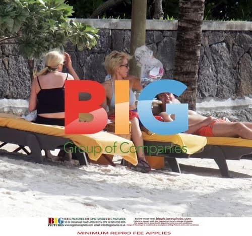 Heather Mills on beach holiday with boyfriend