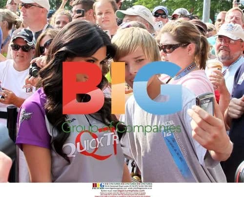 Kim Kardashian with fan at Indianapolis 500