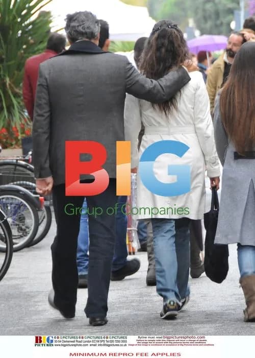 Andrea Bocelli shops and cycles with girlfriend and son