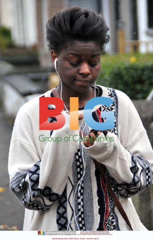 Gamu Nhengu Listening to Music at Home