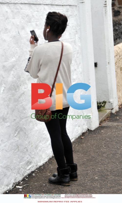 Gamu Nhengu Listening to Music at Home