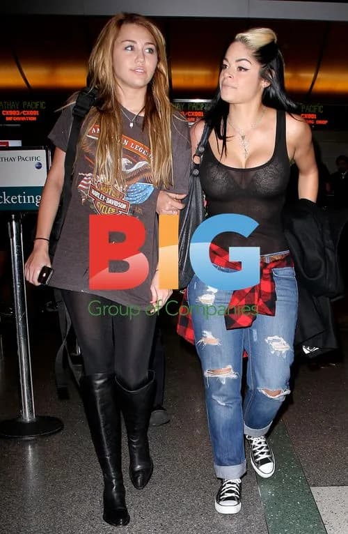 Miley Cyrus Departs LAX