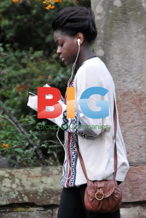 Gamu Nhengu Listens to Music at Home