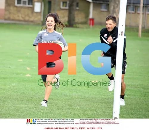 Gavin Henson and Katya Virshilas Practicing Rugby Tackles