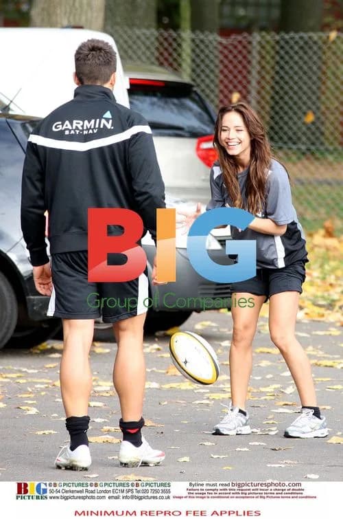 Gavin Henson and Katya Virshilas practice rugby tackles
