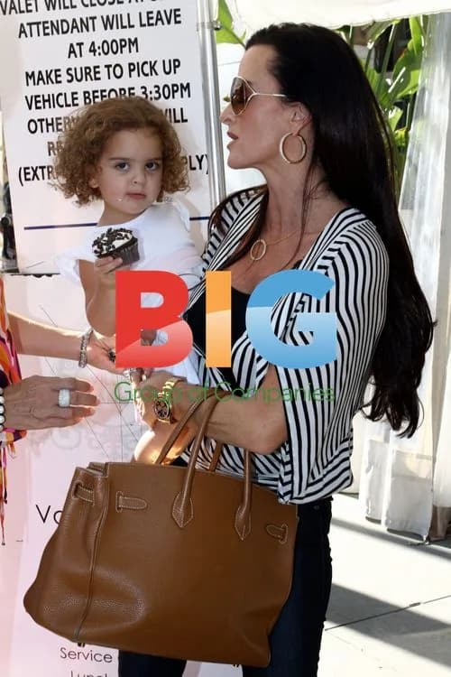 Kyle Richards Leaves Villa Blanca