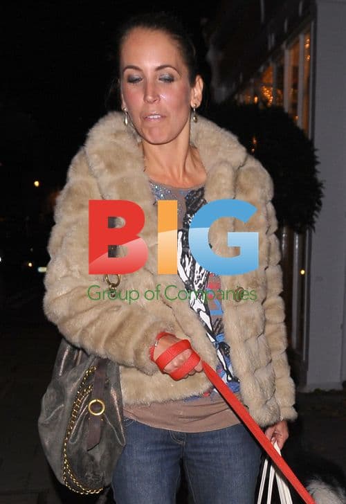 Jasmine Harman and dog leaving restaurant