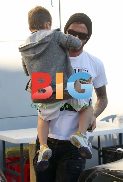 David Beckham and Son at 'Color Me Mine'