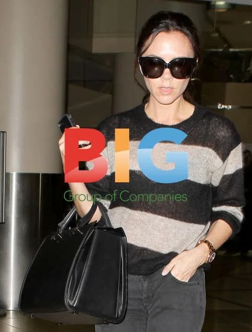 Victoria Beckham Arrives at LAX in Sheer Sweater