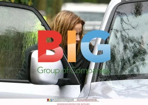 Charlotte Church with kids in the rain