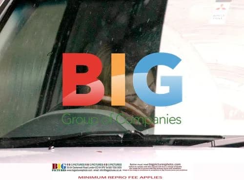 Charlotte Church and Kids Brave Rain for Drive-Thru