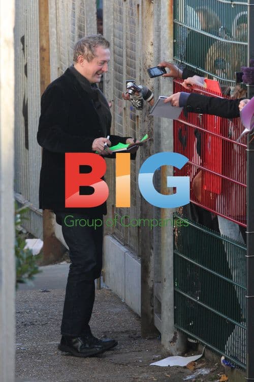 Louis Walsh Signing Autographs
