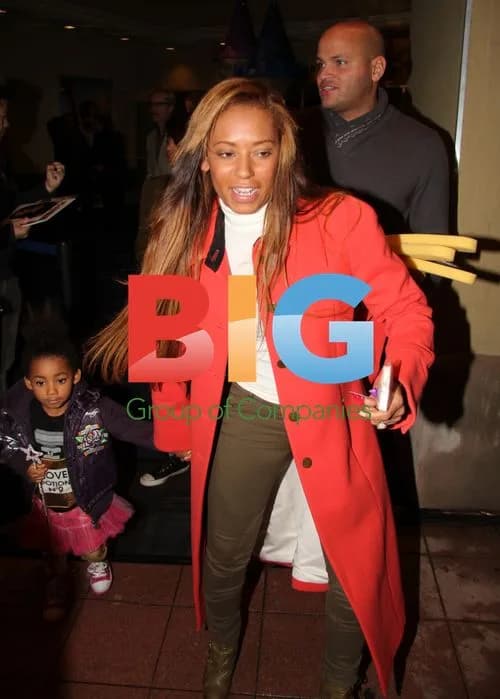 Melanie Brown Leaves Party with Family