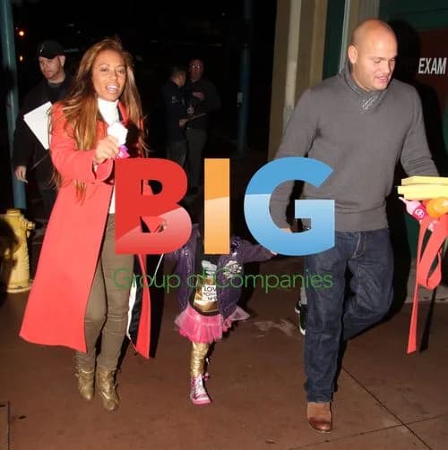 Melanie Brown Leaves Party with Family