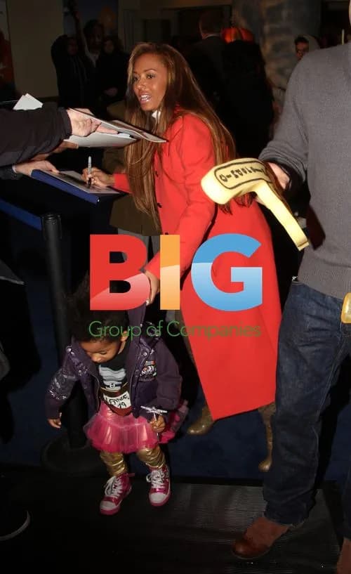 Melanie Brown Leaves Party with Family