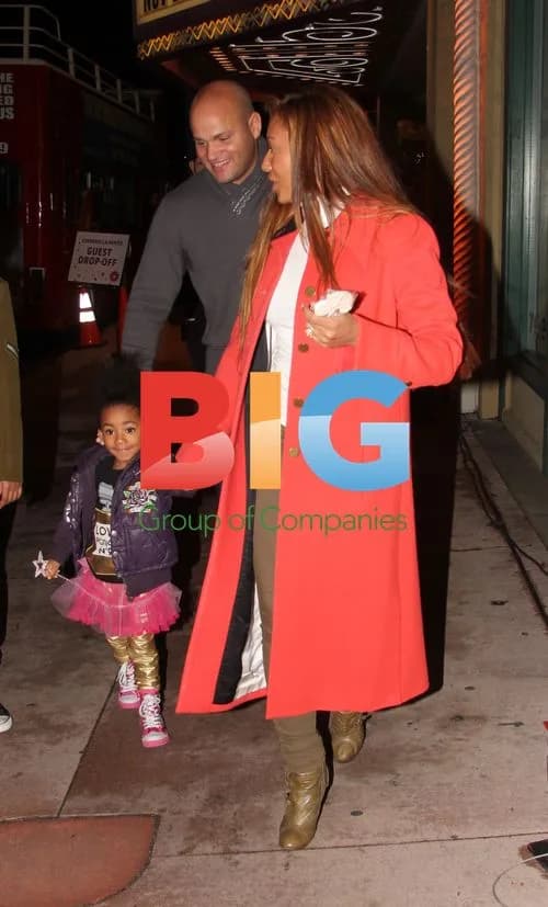Melanie Brown Leaves Party with Family