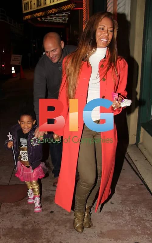 Melanie Brown Leaves Party with Family