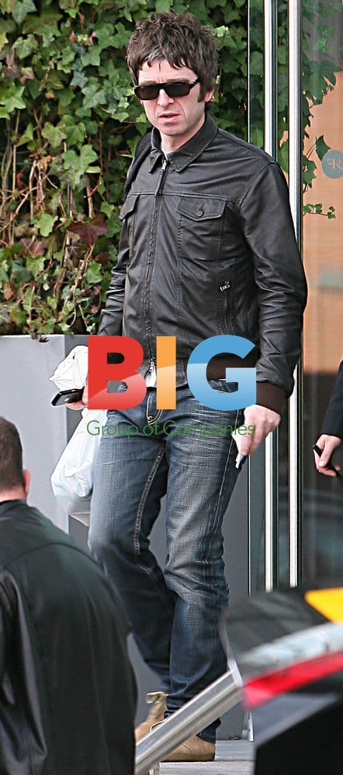 Noel Gallagher Leaving Hotel in Manchester