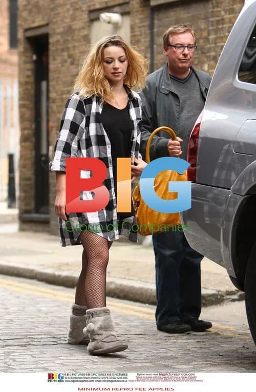Charlotte Church Breaks from Photo Shoot