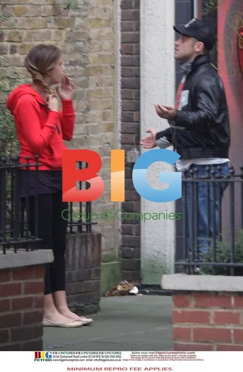 Robbie Williams Spotted Out With Woman