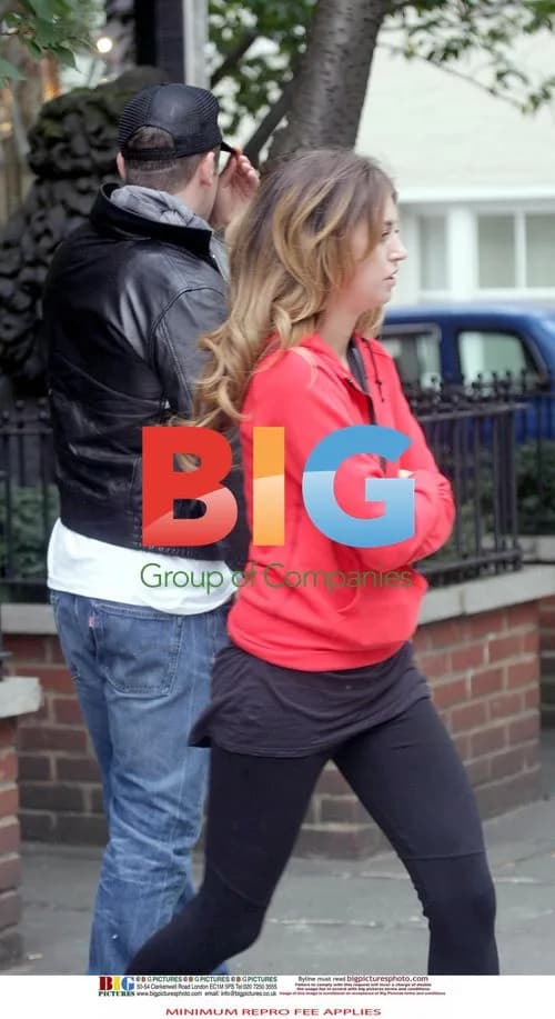 Robbie Williams Spotted with Mystery Woman