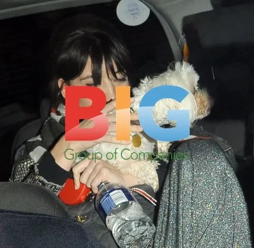 Daisy Lowe with Fluffy Dog at Connaught Hotel