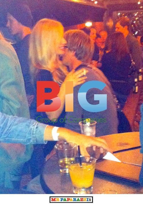 Kris Marshall drinks and dances with blonde woman