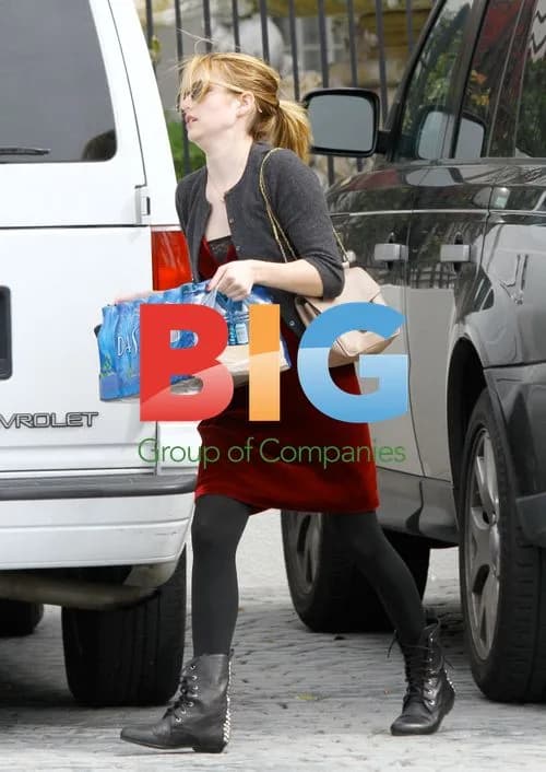 Emma Roberts Carries Water Bottles