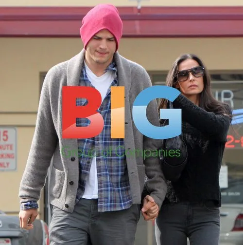 Ashton Kutcher Helps Demi Moore