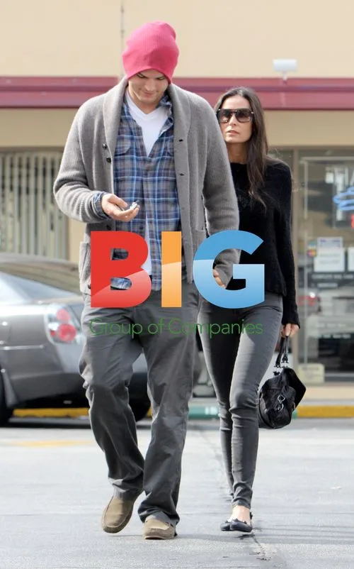 Ashton Kutcher Opens Car Door for Demi Moore