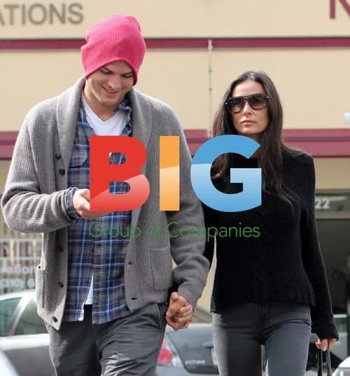 Kutcher Opens Car Door for Moore