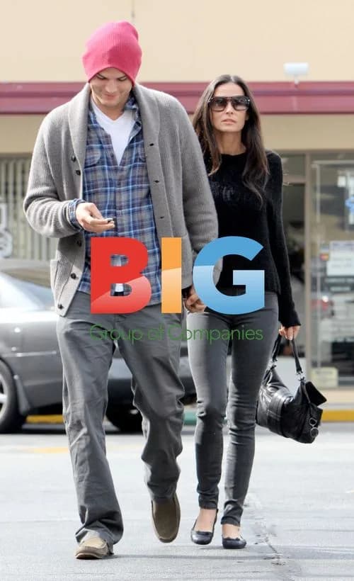 Ashton Kutcher Opens Car Door for Demi Moore