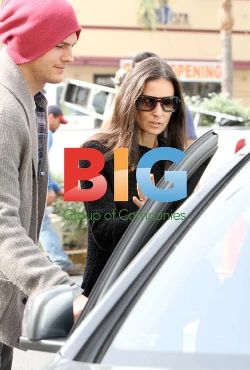 Ashton Kutcher opens car door for Demi Moore