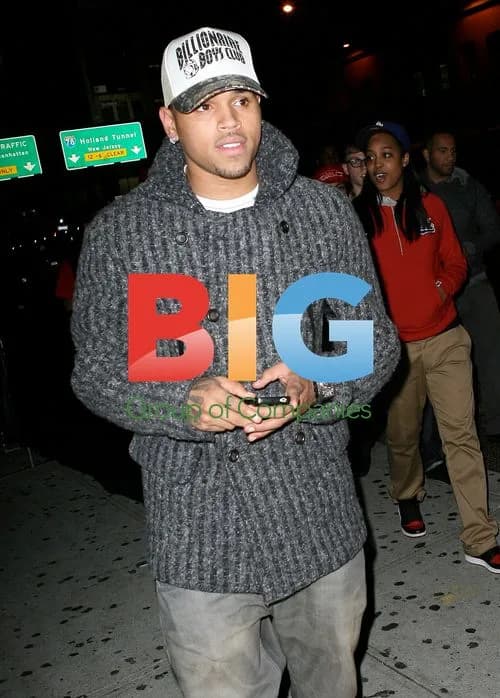 Chris Brown Walks with Friends in NYC