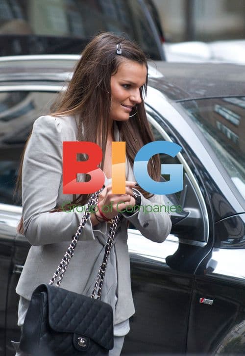 Liverpool footballer Martin Skrtel and girlfriend leaving hotel