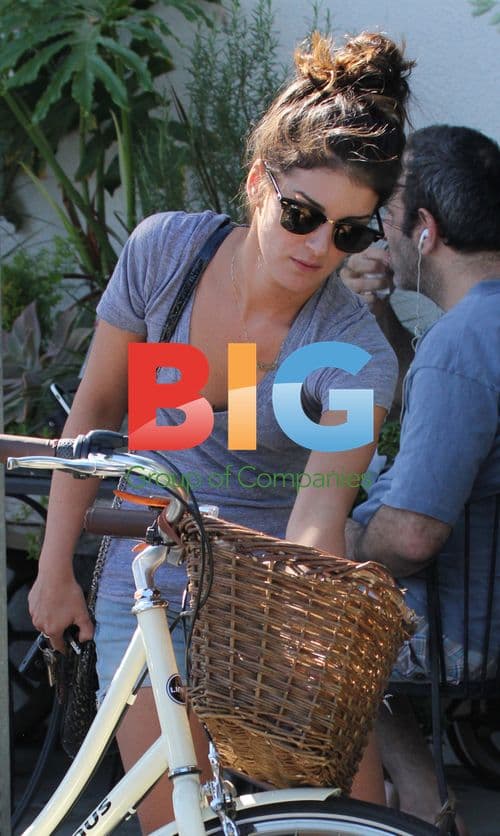Shenae Grimes Locks Up Bike in LA