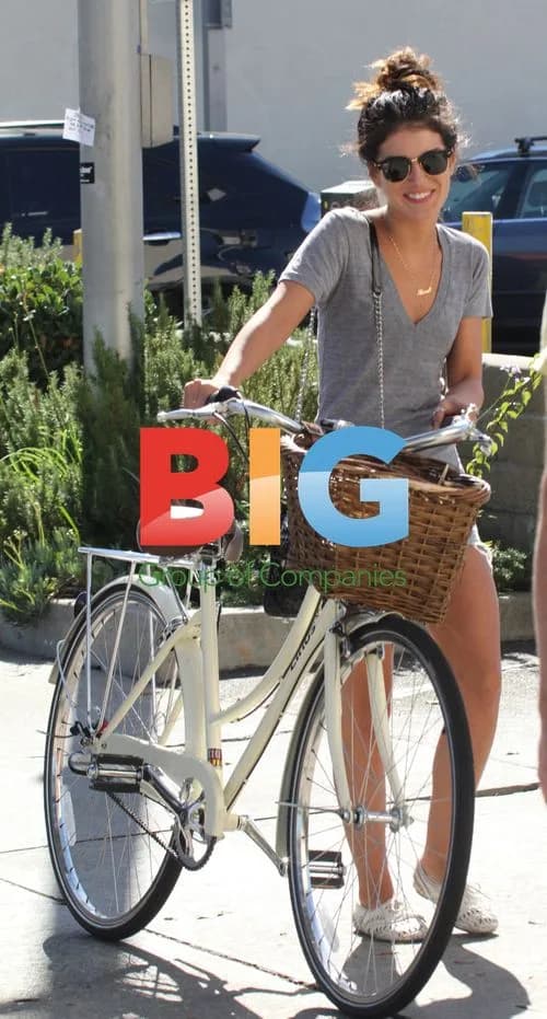 Shenae Grimes Locks Up Bike in LA