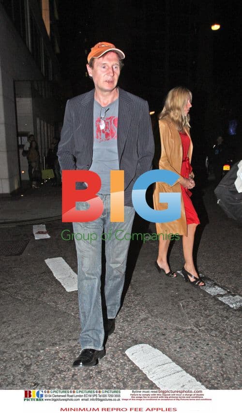 Liam Neeson spotted with mystery blonde