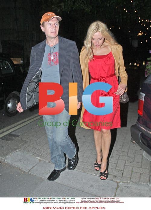 Liam Neeson with Blonde Companion