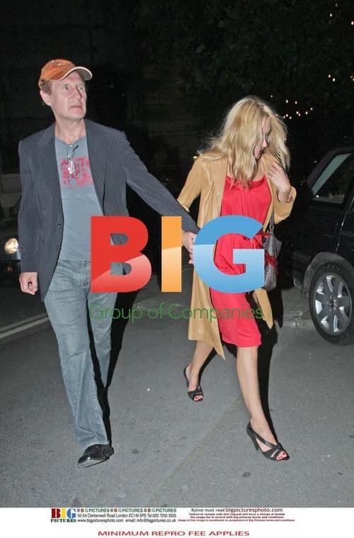 Liam Neeson spotted with mystery blonde