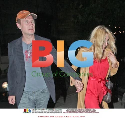 Liam Neeson with mystery blonde