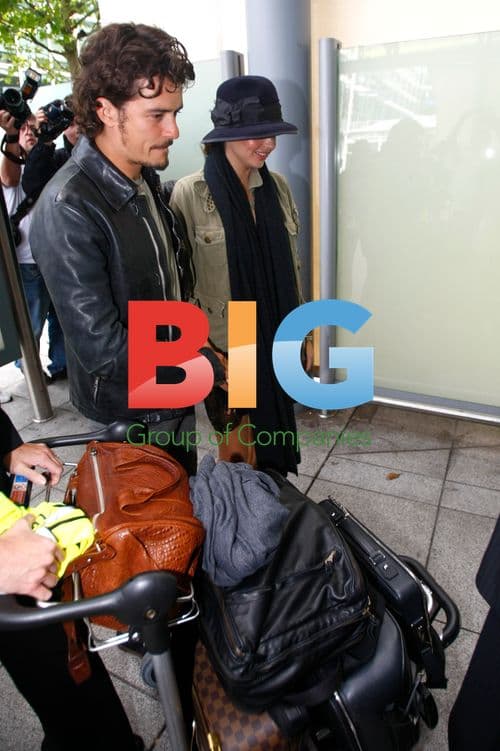 Orlando Bloom and Miranda Kerr at Heathrow