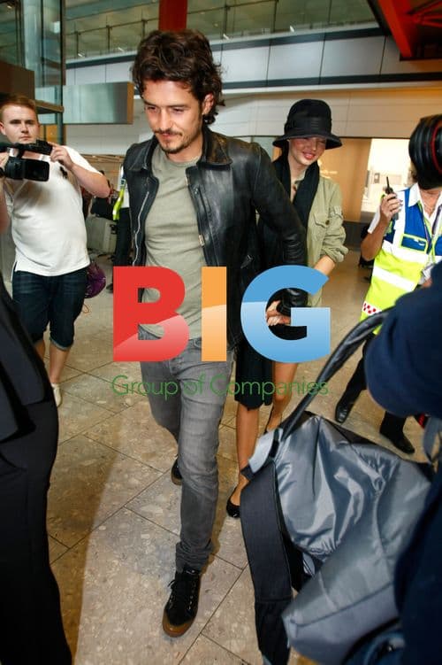 Orlando Bloom and Miranda Kerr at Heathrow