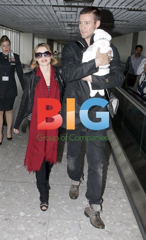 Dannii Minogue, Kris Smith and baby Ethan arrive