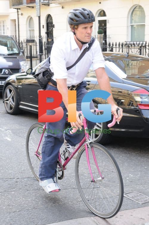 James Cracknell out on his pink bike in London