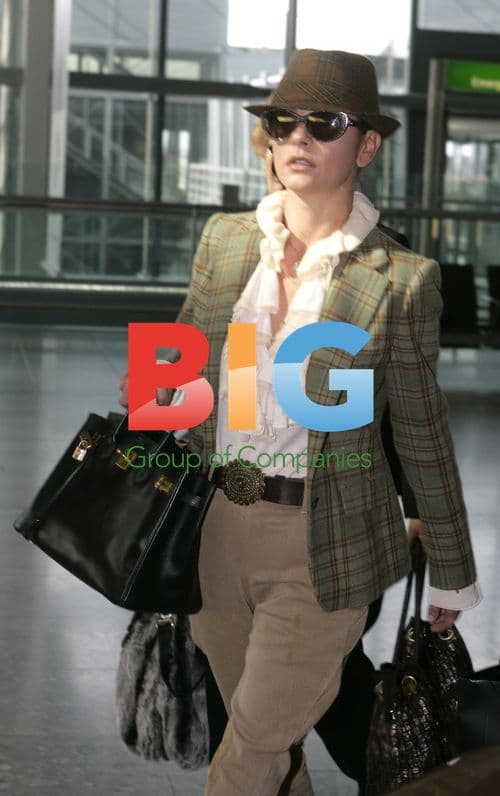 Katherine Zeta Jones Departs Heathrow